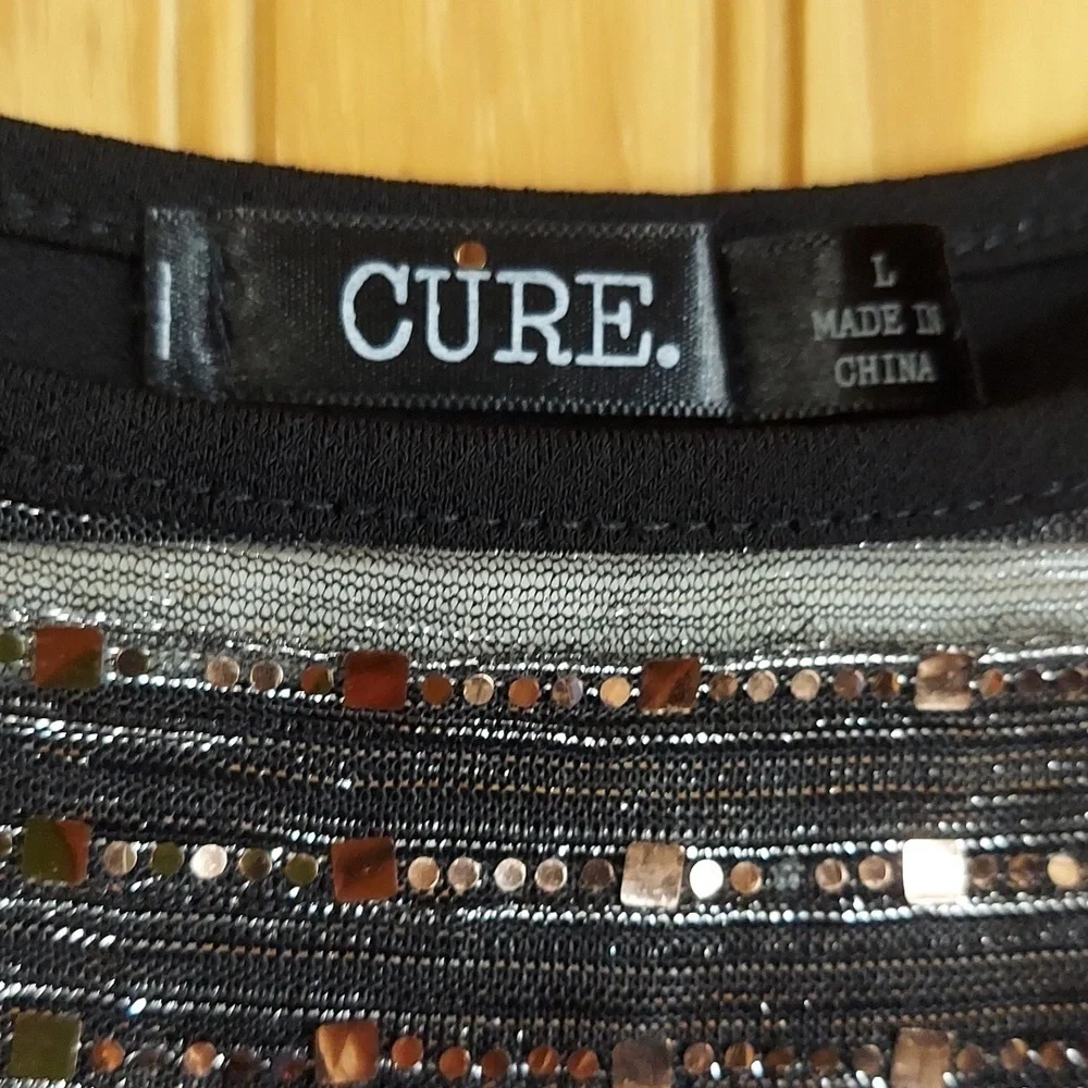 CURE - Picture 3 of 7